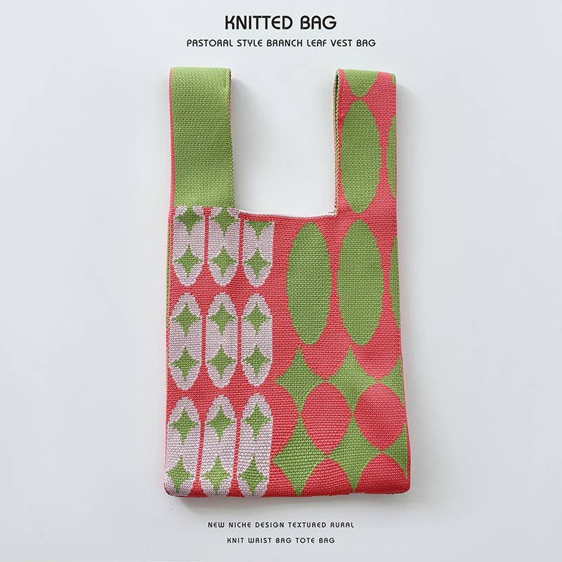 Heart-shaped color-blocked knitted handbag