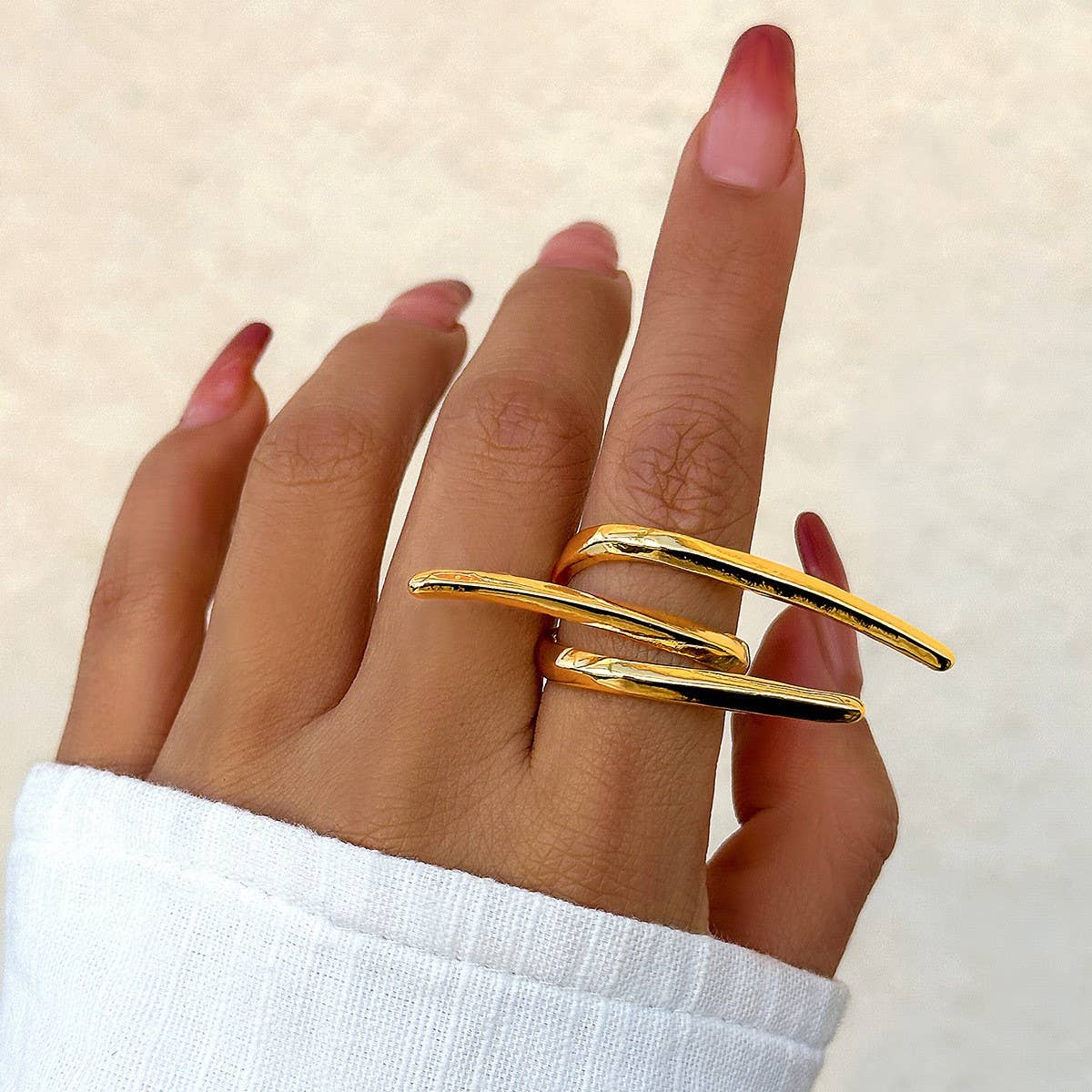 SIMPLE ASYMMETRICAL STATEMENT FRENCH RING