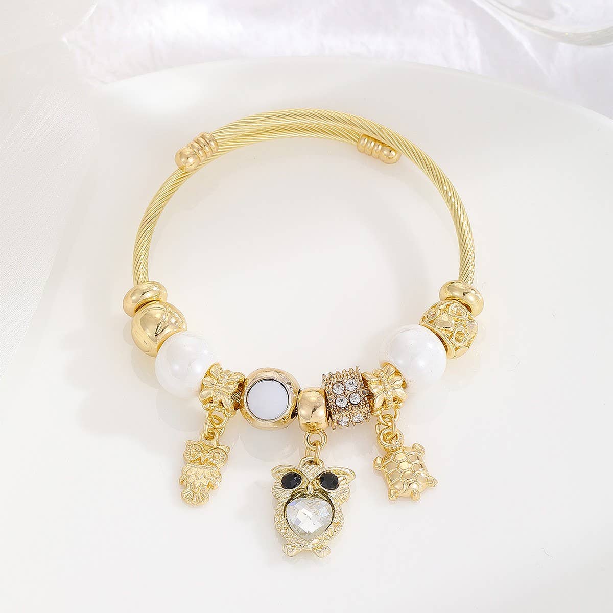 Gold Bracelet with Tree, Heart & Tail Charms