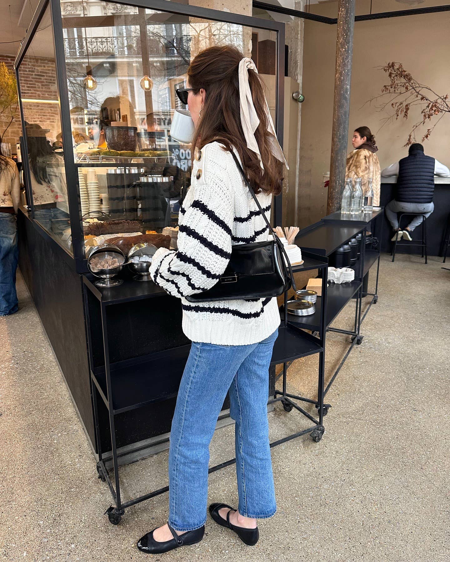 Buttons embellished with striped twist sweaters