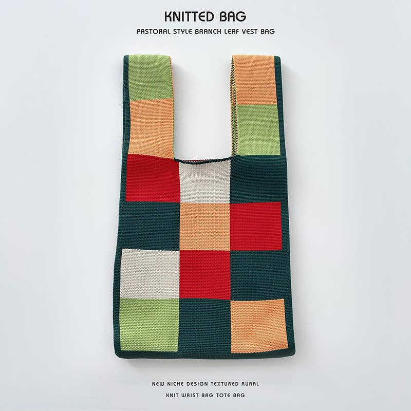 Heart-shaped color-blocked knitted handbag