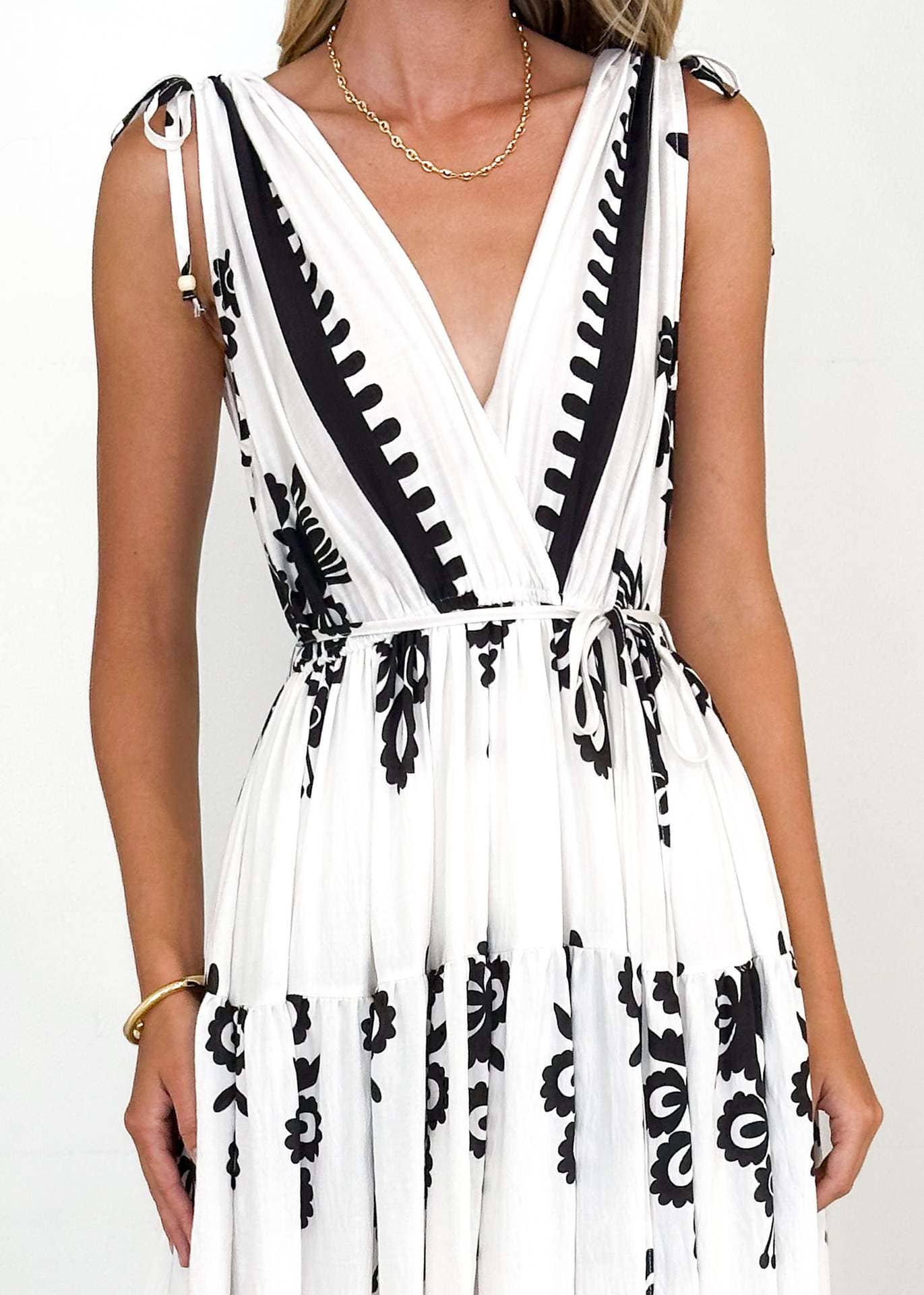 Cinched waist large hem printed V-neck dress