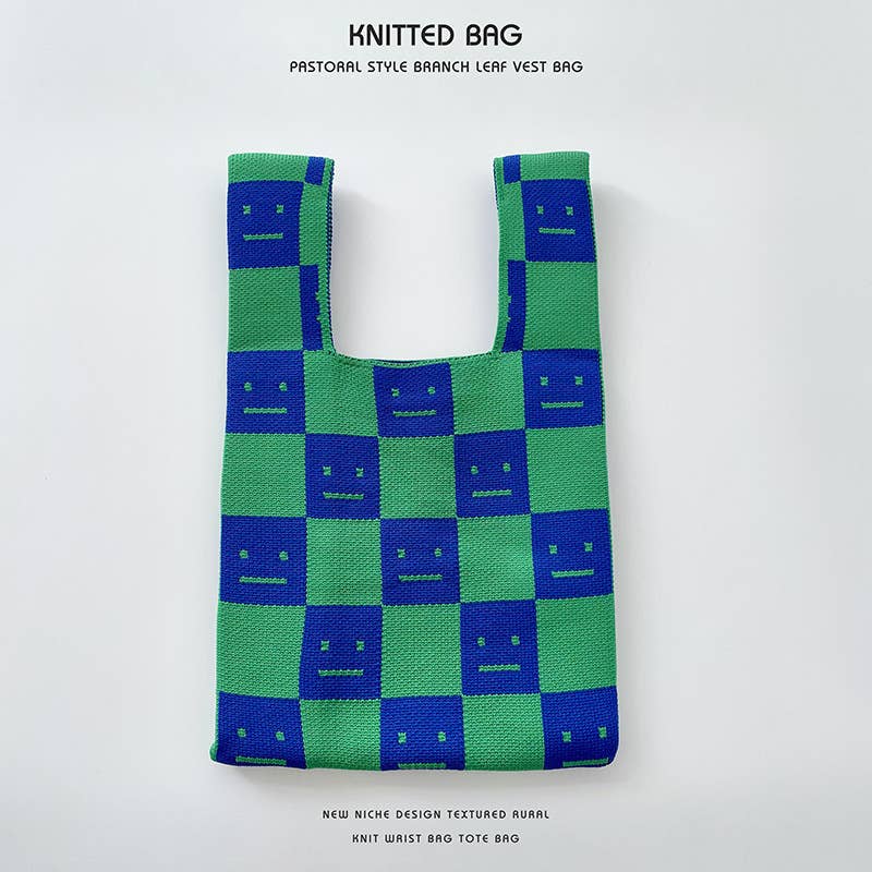 Heart-shaped color-blocked knitted handbag