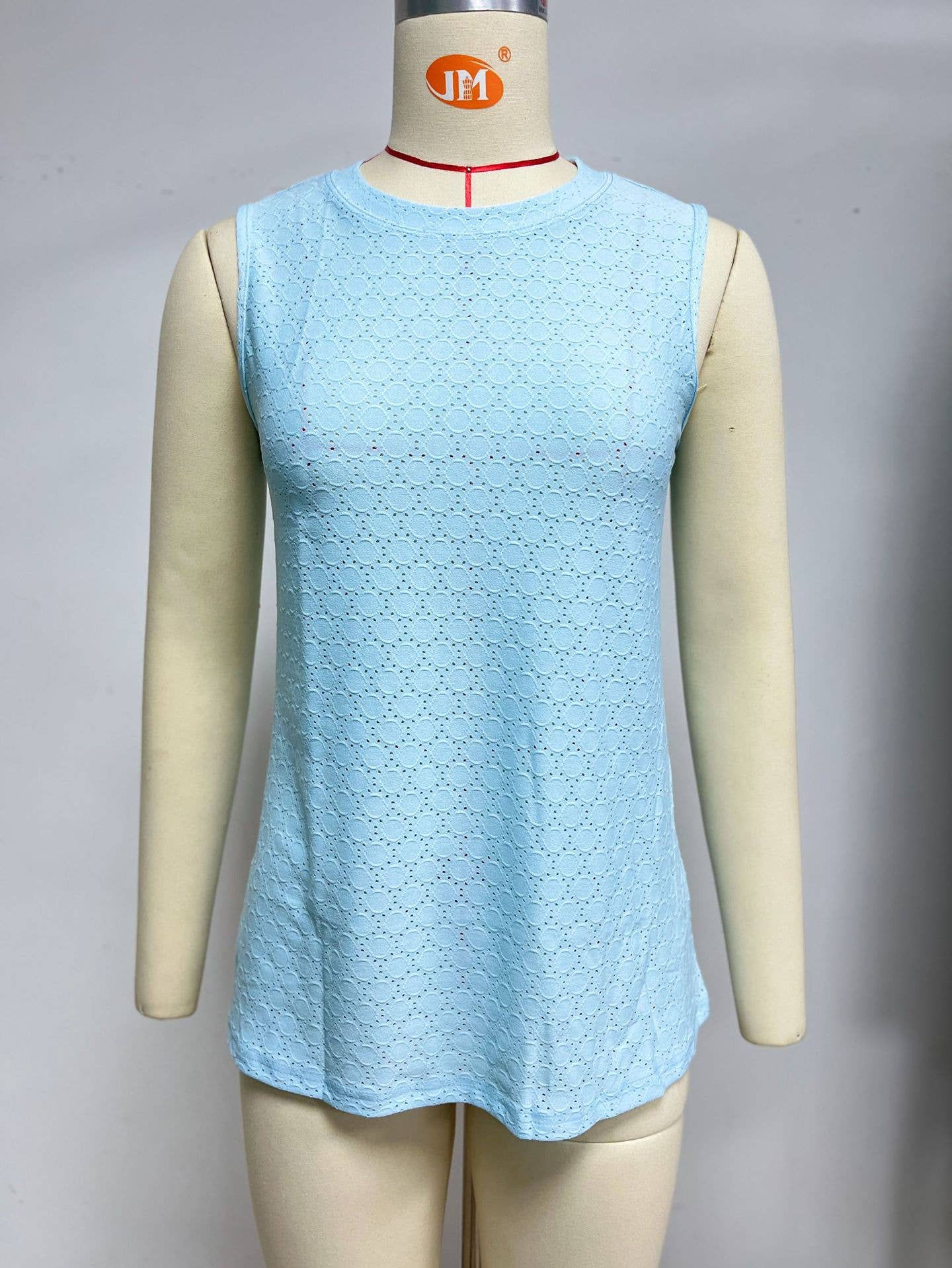 Crew-neck printed solid color hollow-out vest