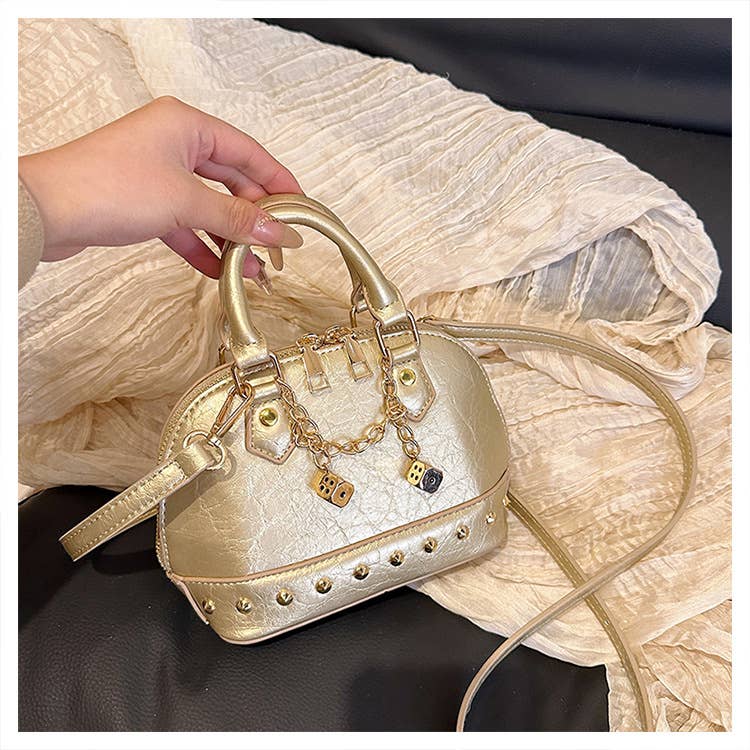 Fashionable riveted single-shoulder bag