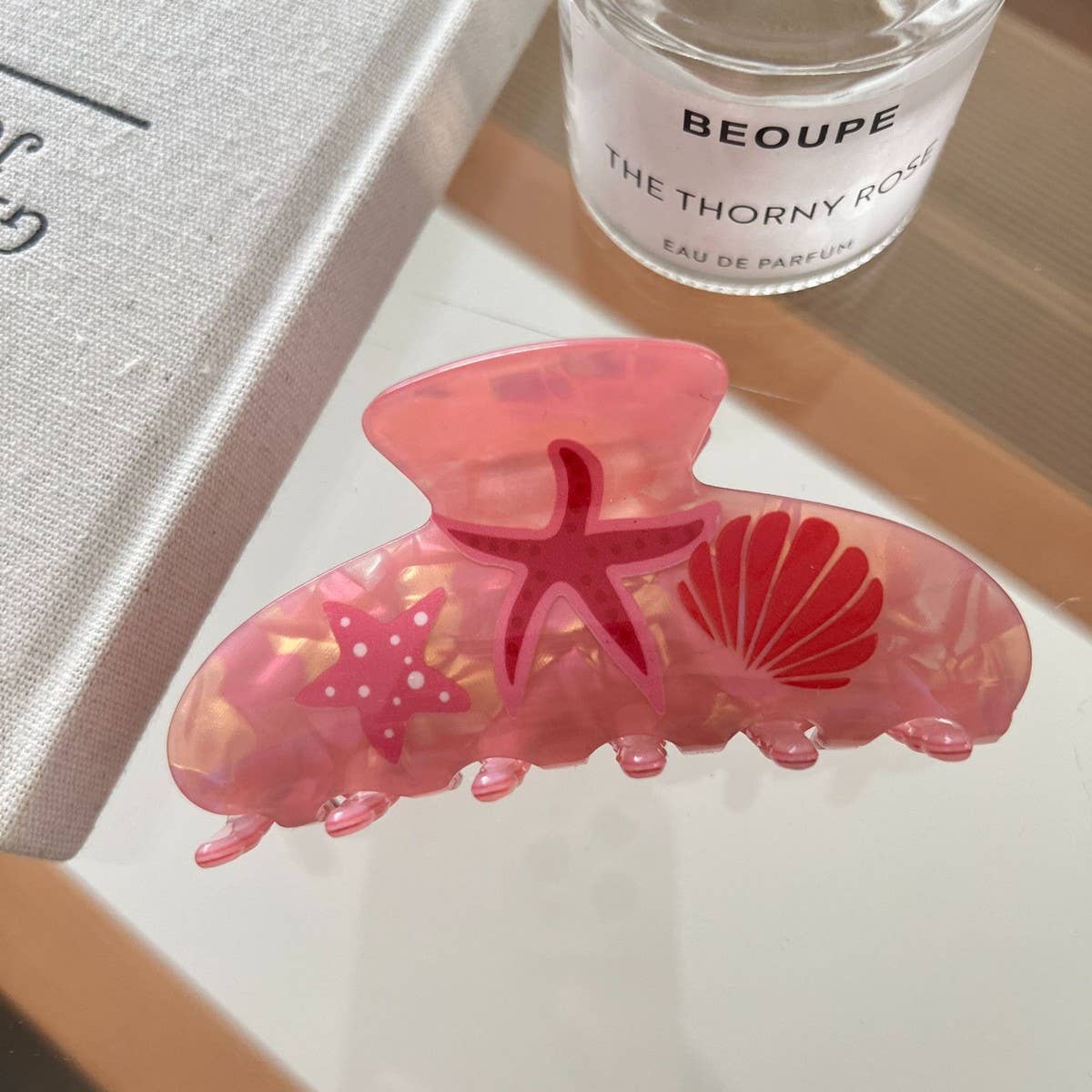 CWAHA07745_ACETATE STARFISH OCEAN SHARK HAIR CLAW CLIP