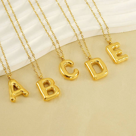 CWAJE1933_Stainless Steel Glossy Bubble Letter Necklace Gold
