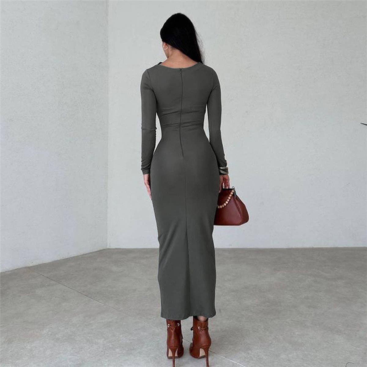 Form-fitting solid color body-hugging dress