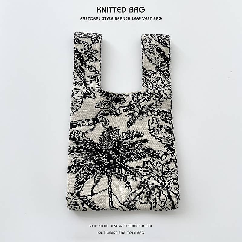 Heart-shaped color-blocked knitted handbag