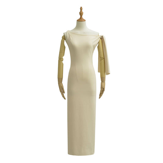 DESIGN DRESS WITH SLOPING SHOULDERS AND STREAMERS