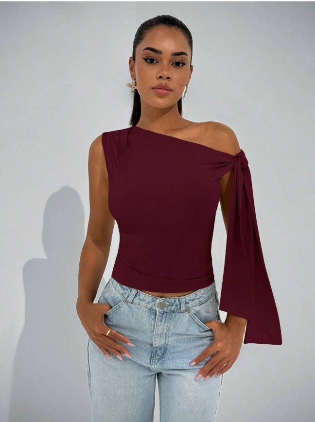 Body-hugging, ribbon-tied, diagonal tie,top