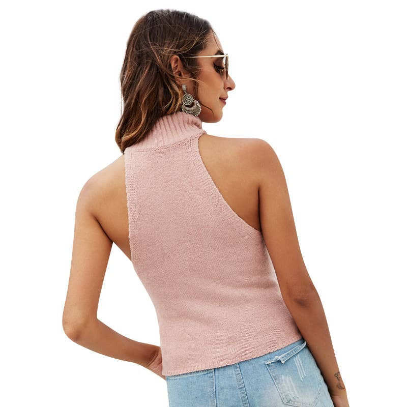 A LITTLE TANK TOP WITH A HALTER AND A MIDRIFF