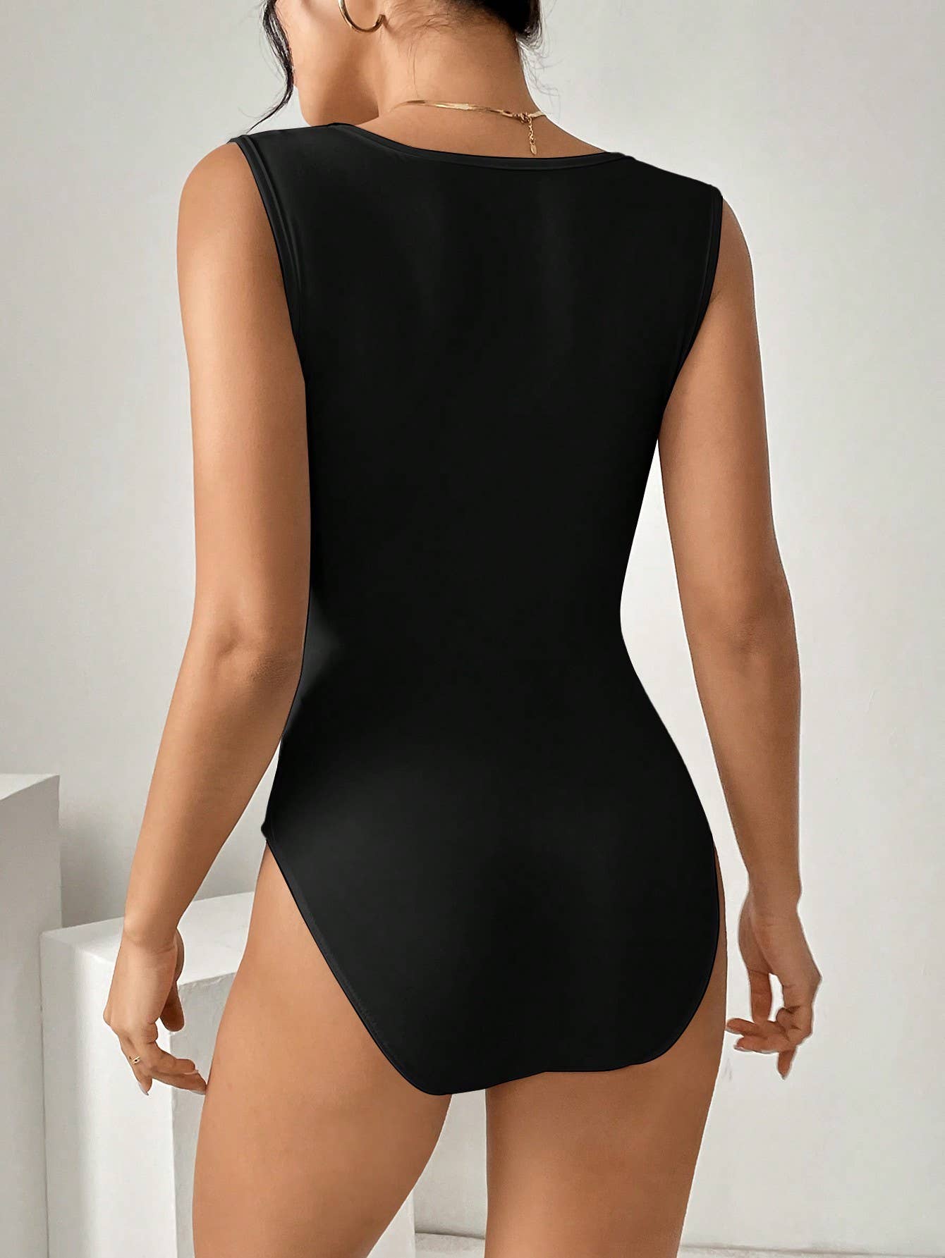 All commuter style three-point tapered onesie