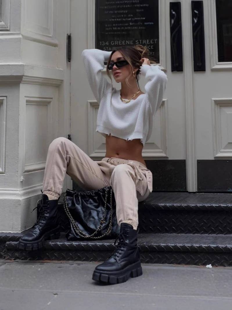 Crop top shoulder and cut-out knitted sweater