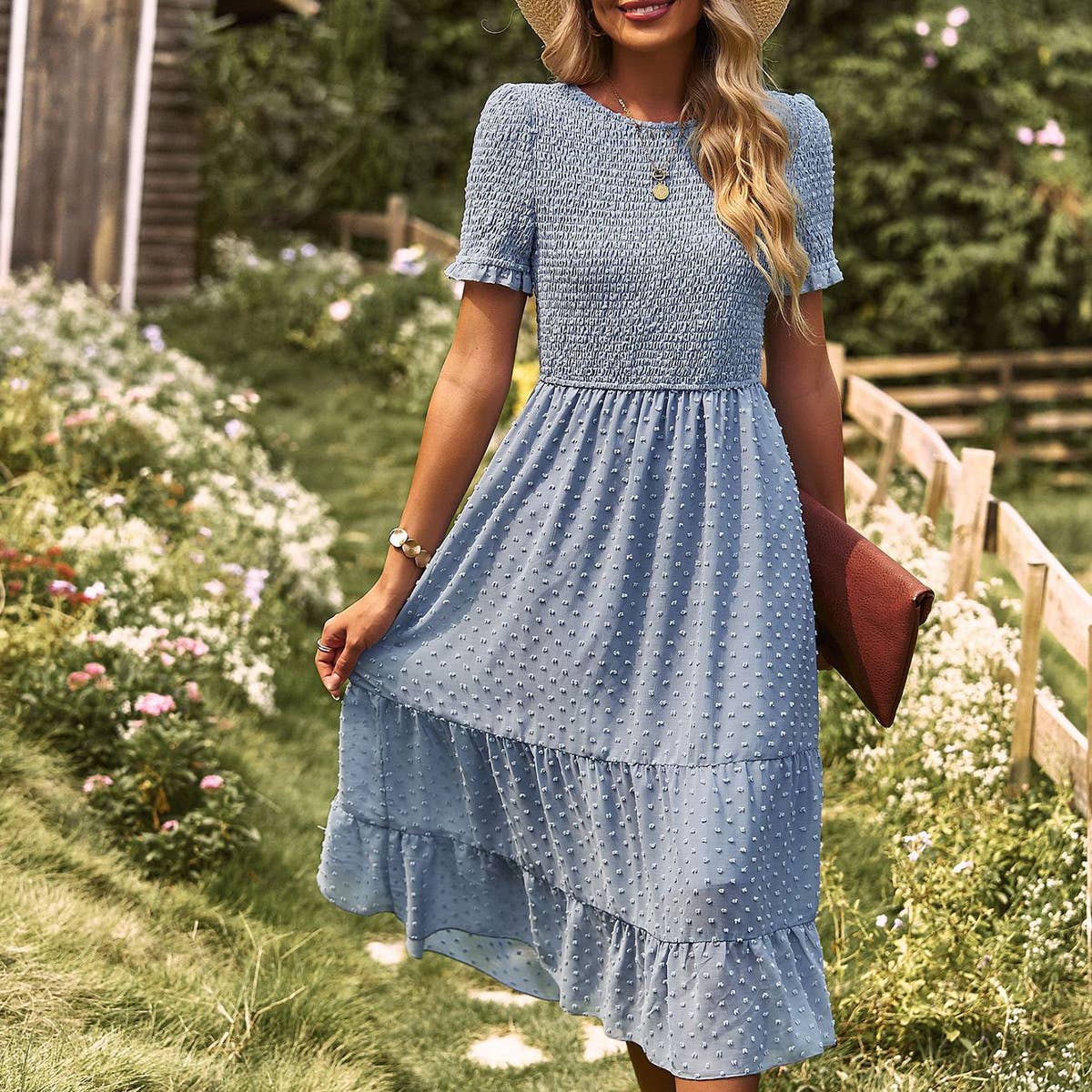 FLAUNTING A FLOWING SLIM-FIT DRESS