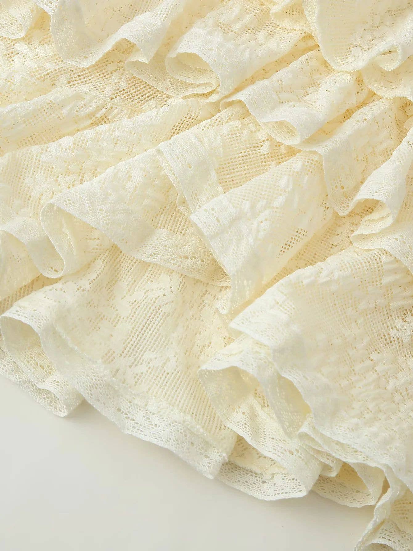 A pure color ruffled design halter top