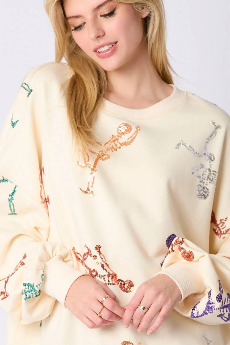 CWTBLL01228_HALLOWEEN SKULL SEQUINED SWEATSHIRT
