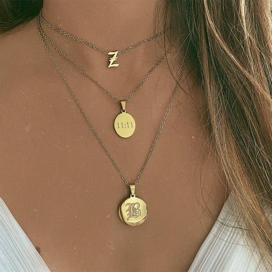 Stainless Steel Simple Oval Letter Necklace_CWMM5651