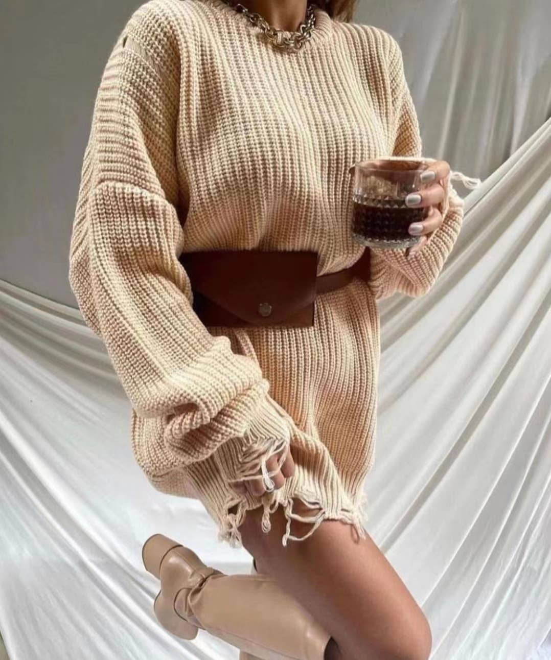 CREW-NECK SWEATER DRESS WITH A HOLE IN THE HEM
