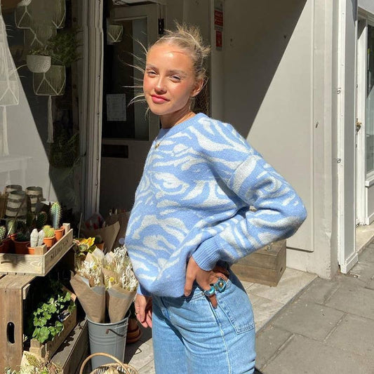 ANIMAL PRINT PULLOVER WITH LOOSE COLLAR