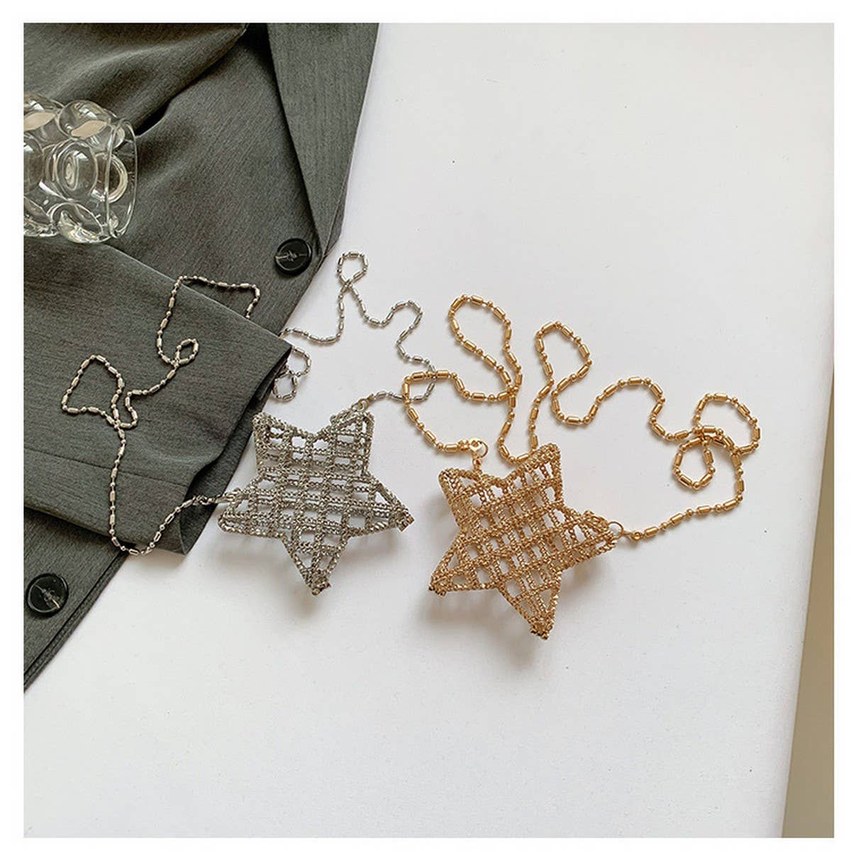 FIVE-POINTED STAR HOLLOW CHAIN SQUARE CLUTCH BAG_CWAB3260