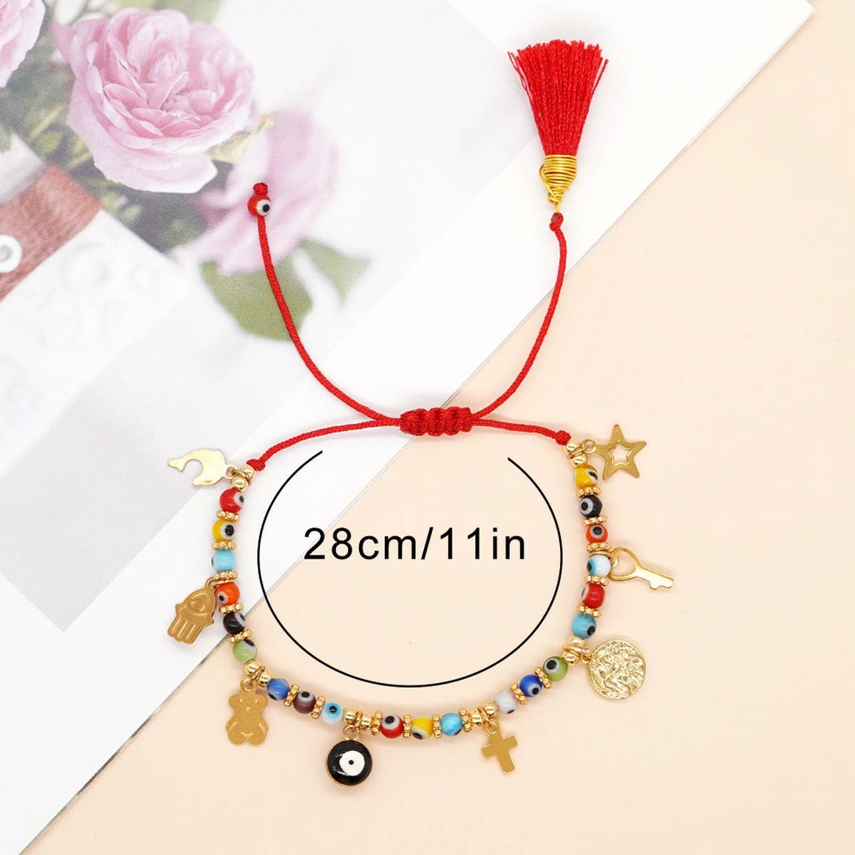 GLASS DEMON EYE METAL PENDANT TASSEL BRACELET