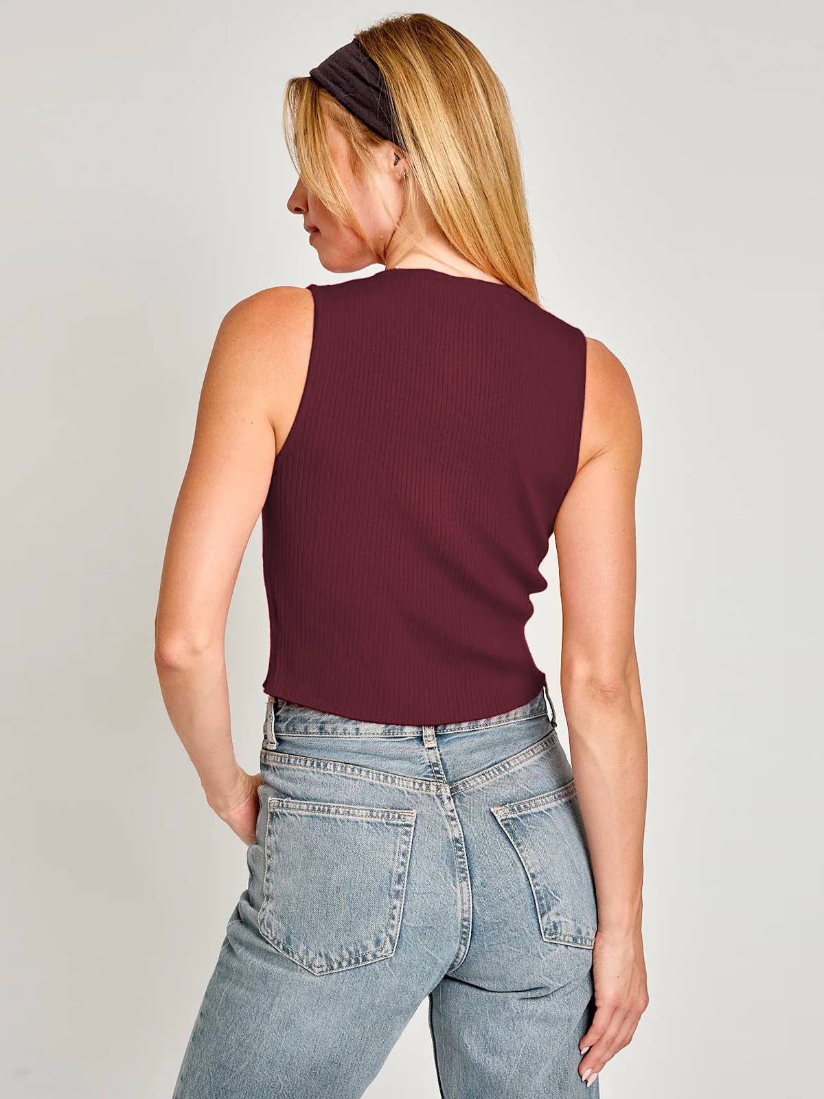 Bow-decorated hollowed-out solid-color vest