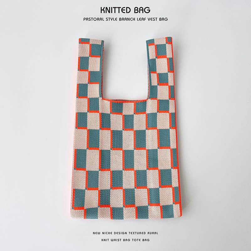 Heart-shaped color-blocked knitted handbag