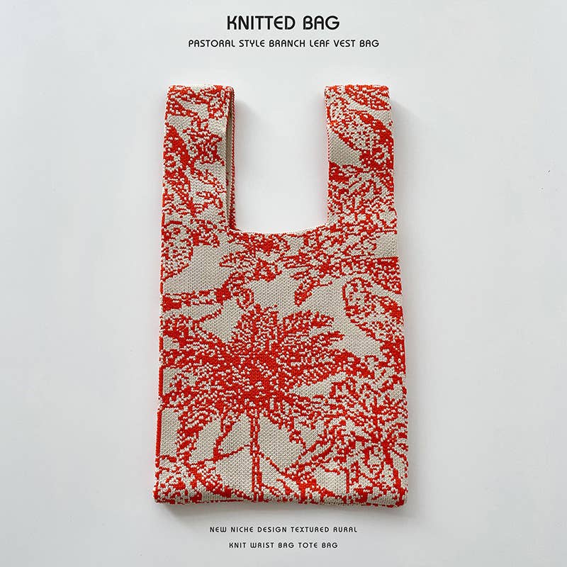 Heart-shaped color-blocked knitted handbag