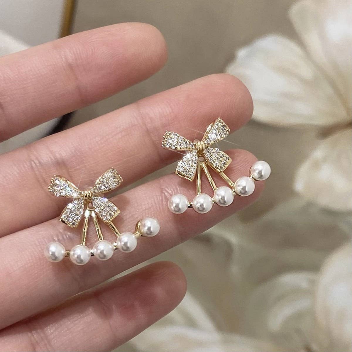 SWEET PEARL INLAID BOW ONE PAIR TWO WEAR EARRINGS