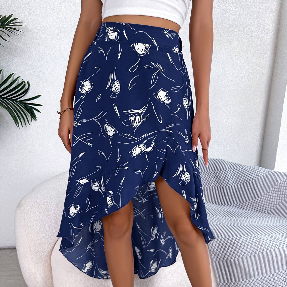 ASYMMETRICAL PEPLUM SKIRT