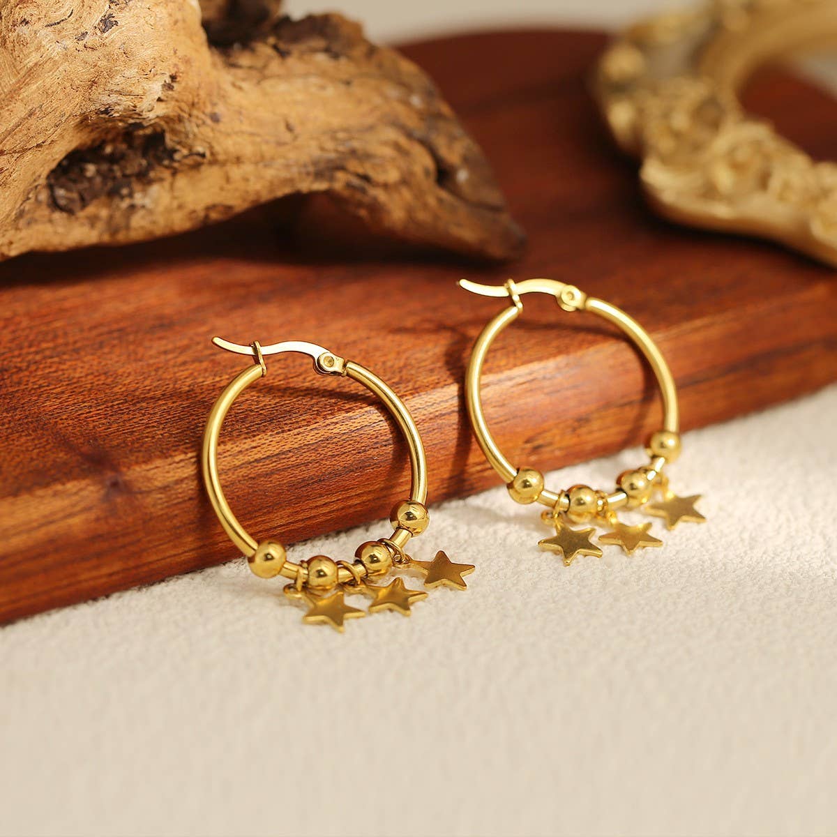 CIRCLE STAINLESS STEEL TWISTED DIAMOND EARRINGS