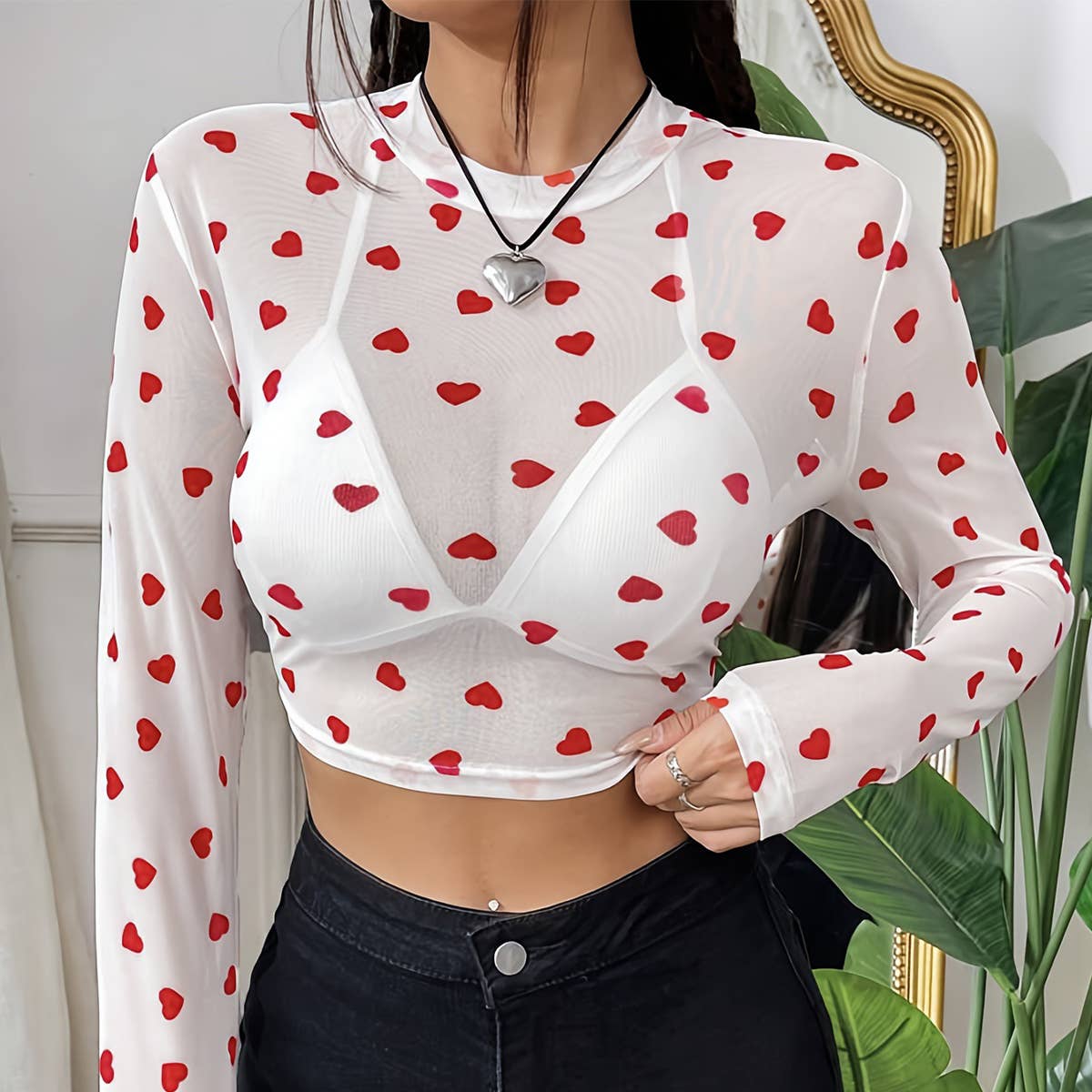 A mesh printed heart-shaped round-neck T-shirt
