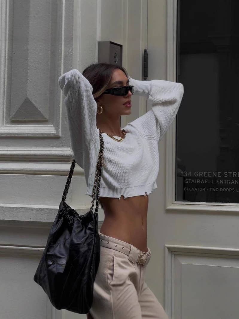 Crop top shoulder and cut-out knitted sweater