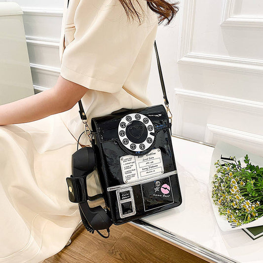 TELEPHONE-SHAPED MESSENGER BAG_CWAB0992