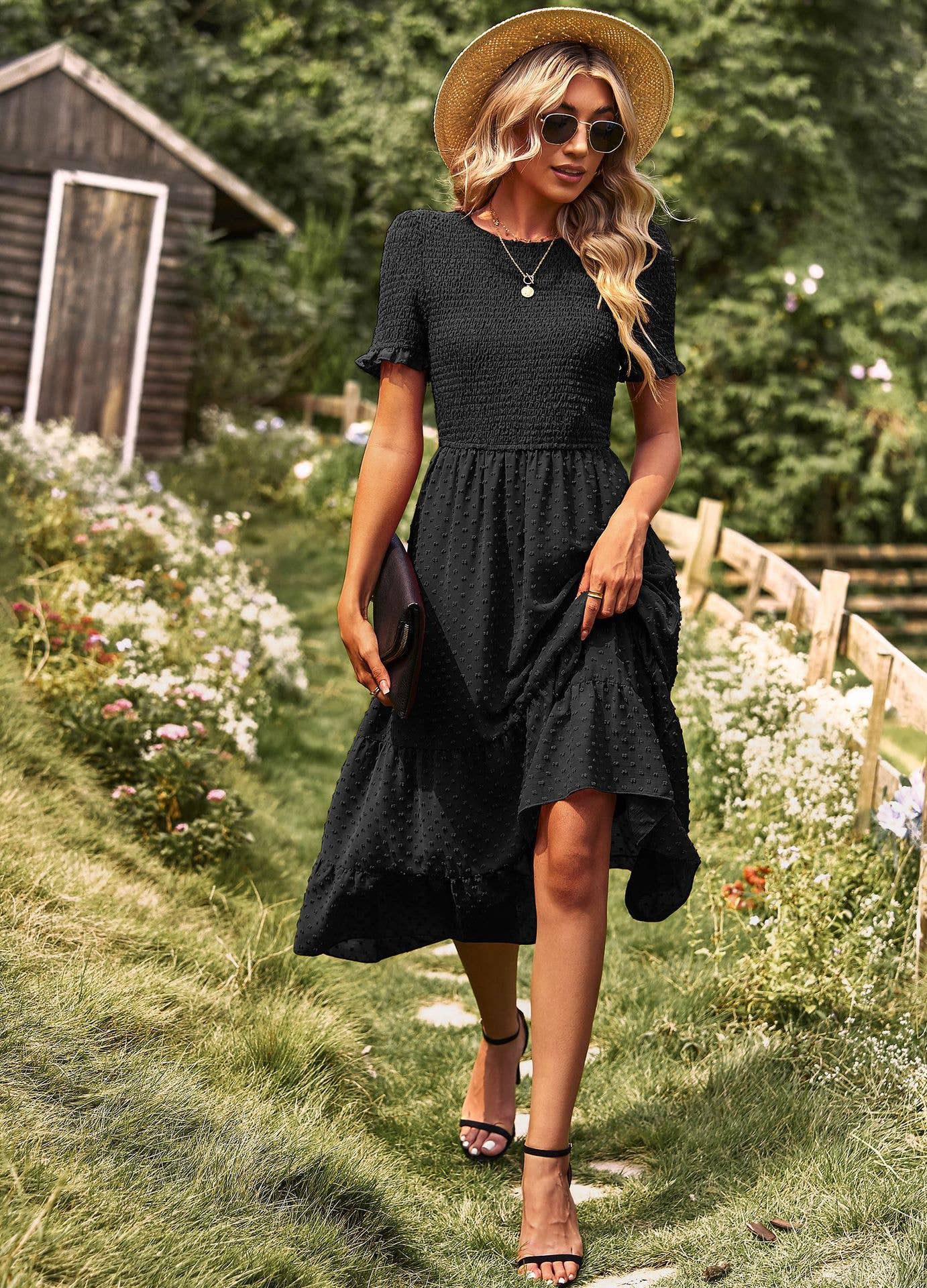 FLAUNTING A FLOWING SLIM-FIT DRESS