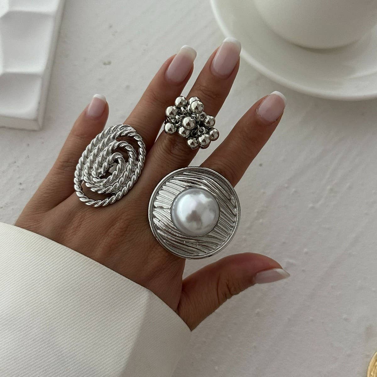 IRREGULAR GEOMETRIC ELLIPSE ALLOY WINDING RING