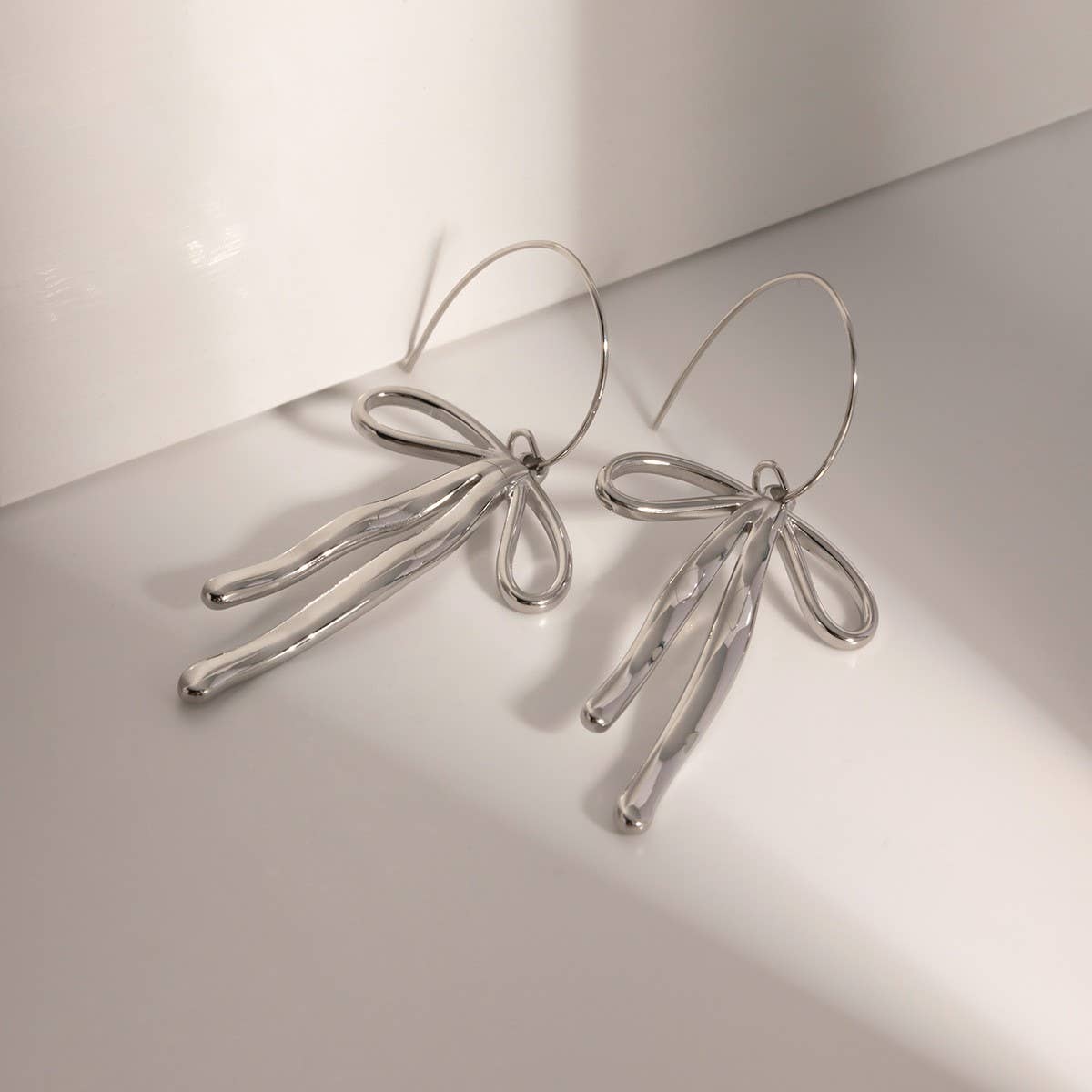 FASHION 18K GOLD STAINLESS STEEL BOW EARRINGS_CWASC1682