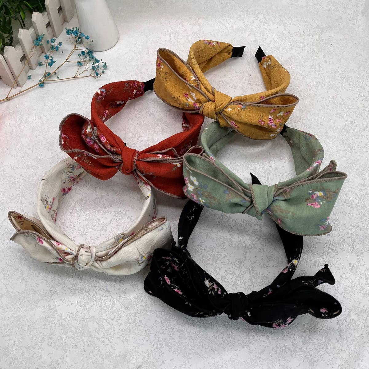 WIDE-BRIMMED FLORAL BOW HEADBAND