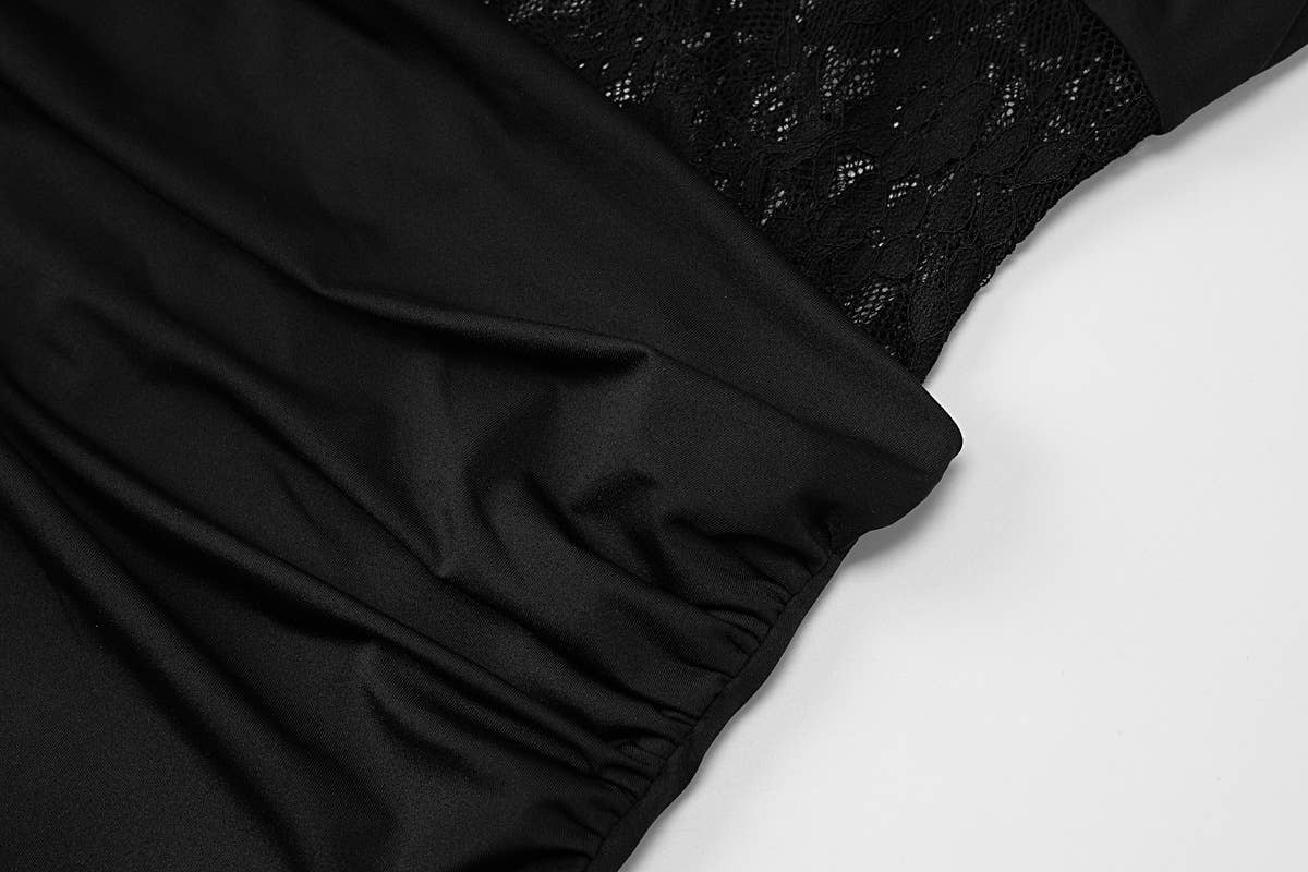 A halter lace cutout dress that covers buttocks