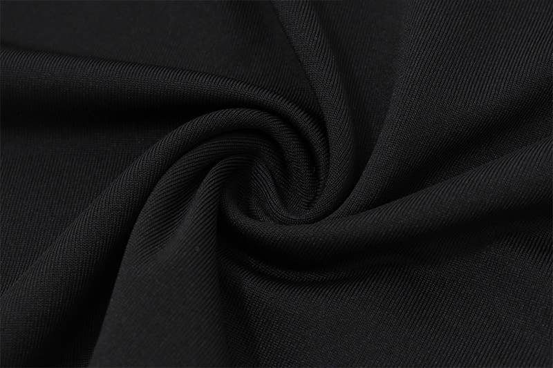 A solid-color fitted knitted top