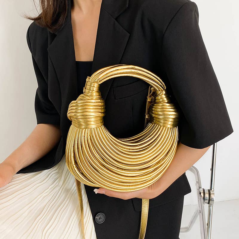 Metallic color striped appearance glossy handbag