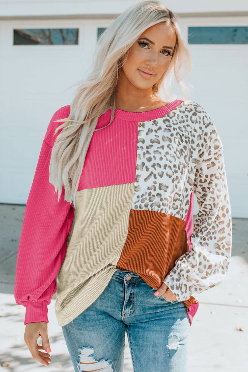 CONTRASTING LEOPARD PRINT KNIT LONG-SLEEVED TOP