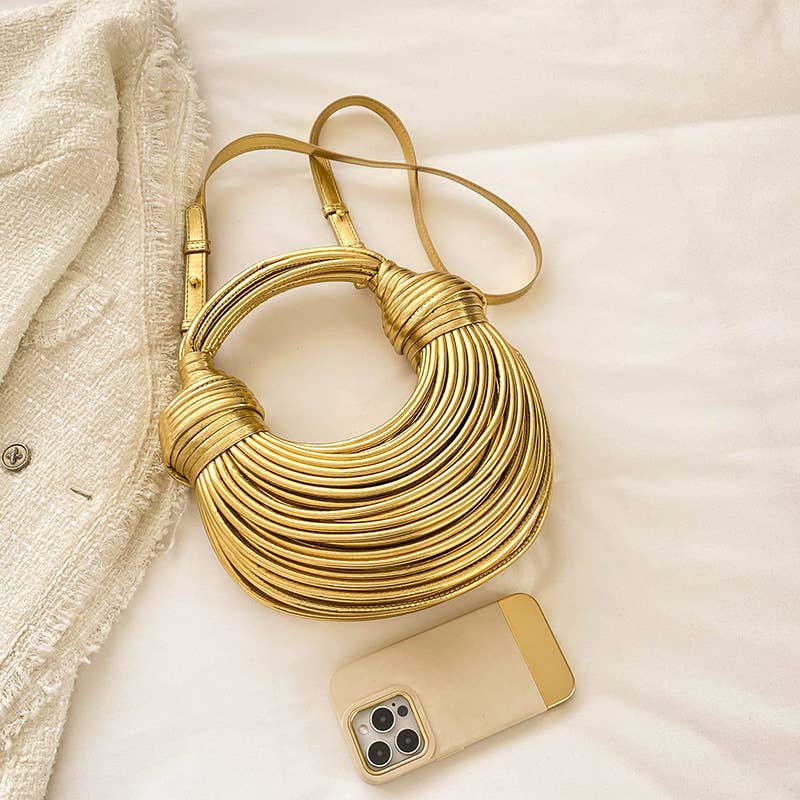 Metallic color striped appearance glossy handbag