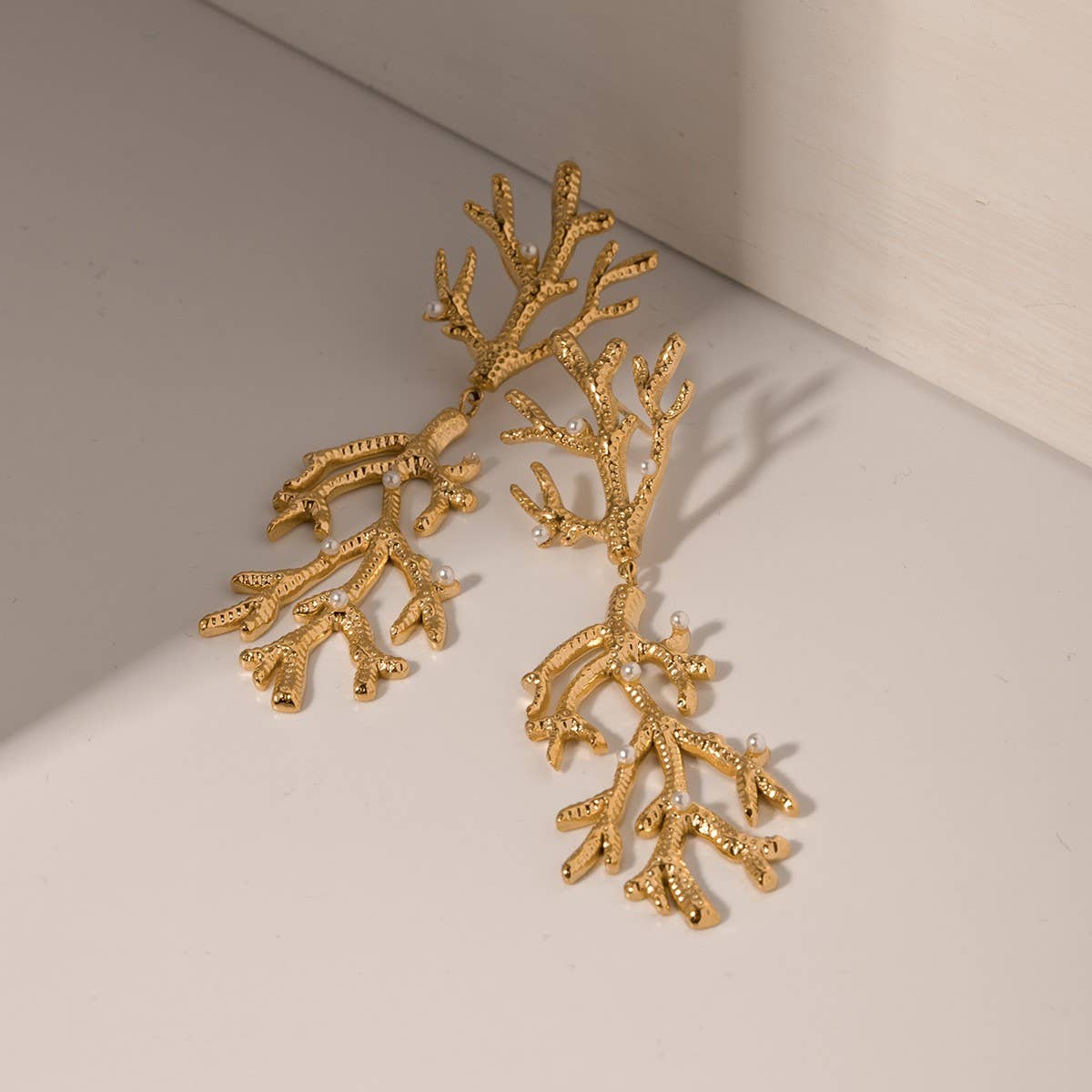 FASHIONABLE PEARL TEXTURE CORAL SHAPED EARRINGS