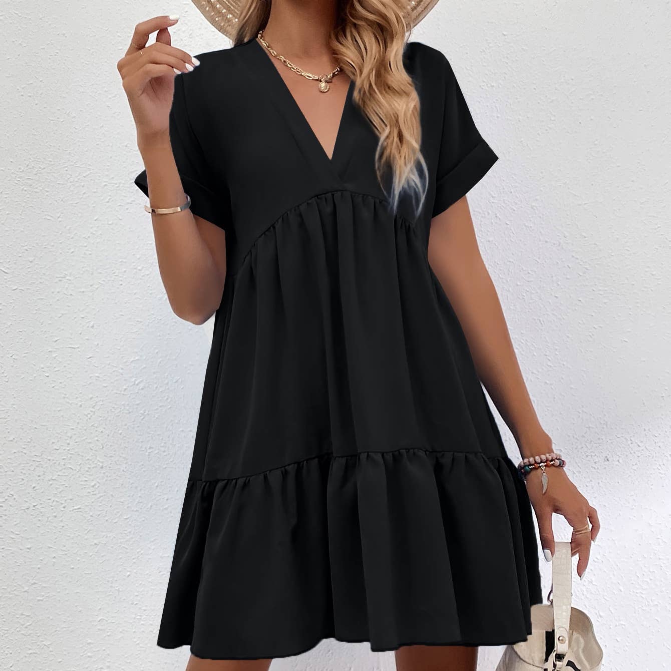 A casual, loose V-neck, large-hem short dress