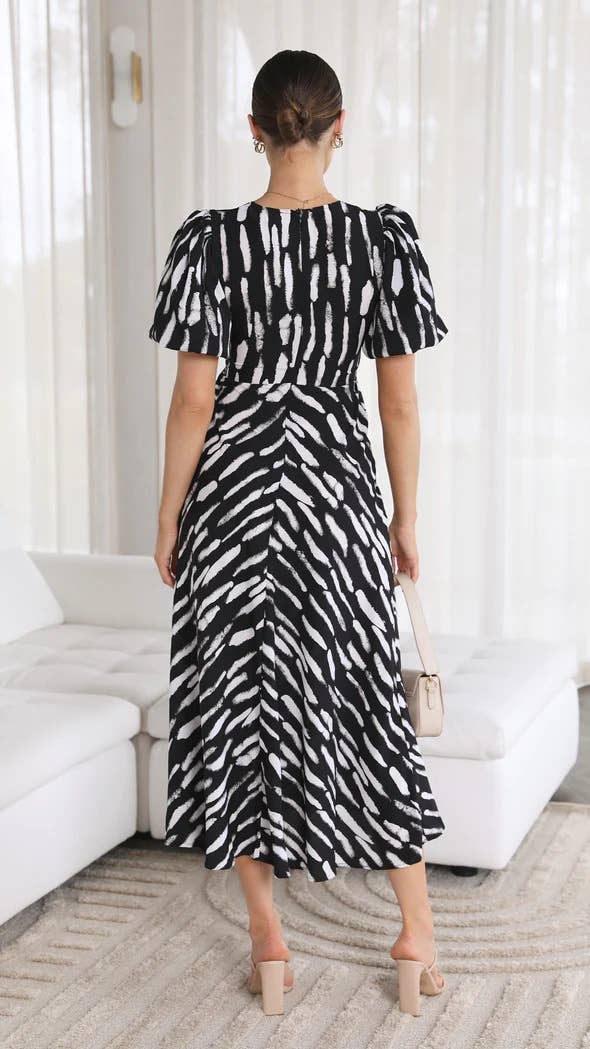 Elegant puffed sleeve irregular printed dress