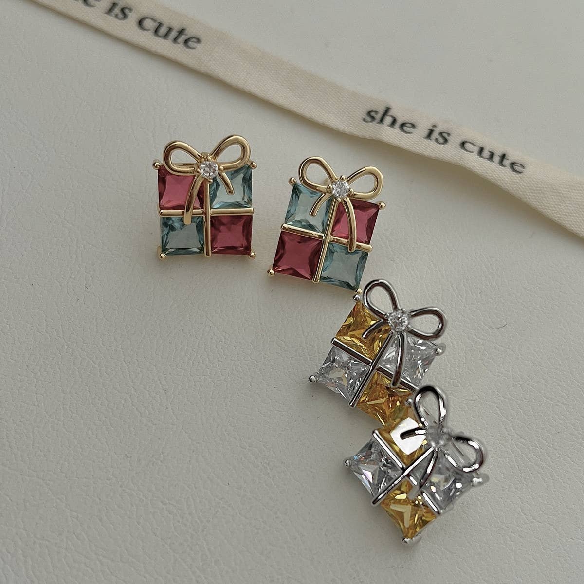 SQUARE ZIRCONIA BOW EARRINGS AND EARRINGS_CWAJE2029