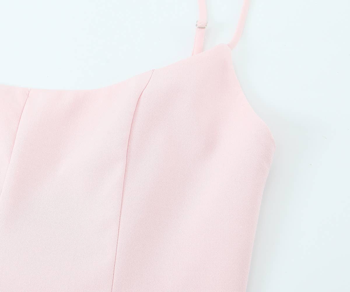 A short halter dress with striped patchwork