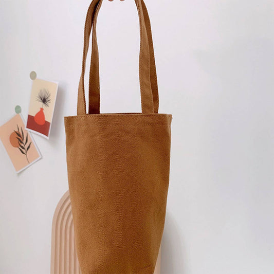 Portable and portable slanting water cup bag